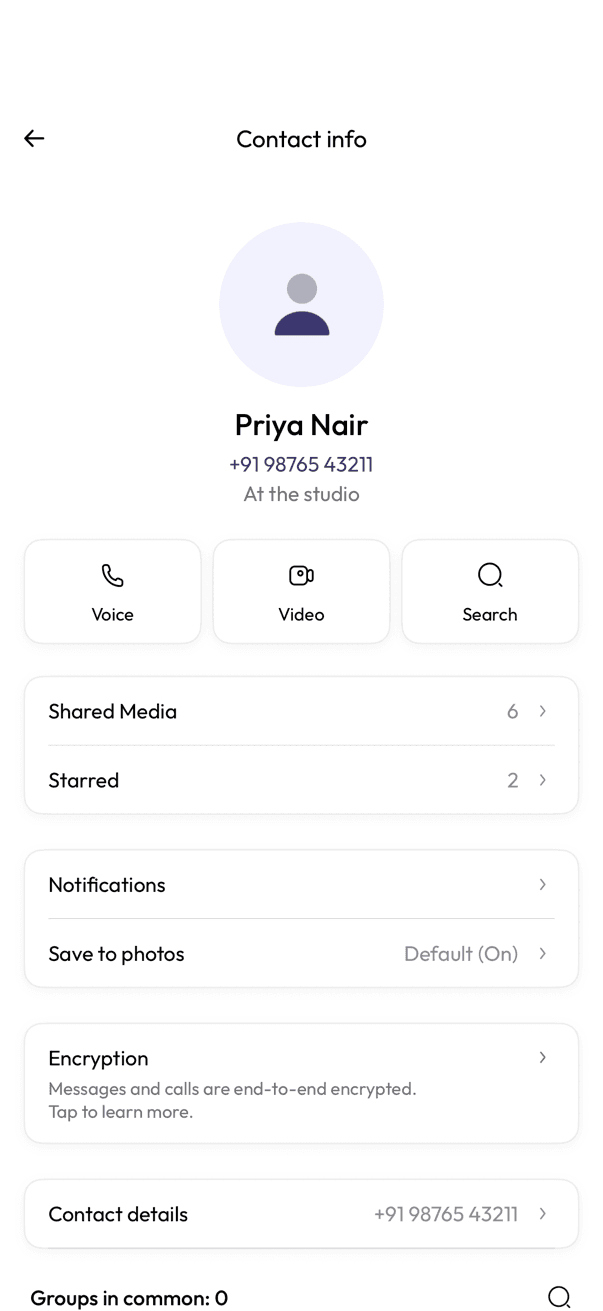 Contact info screen for a person, with call, video, and search actions